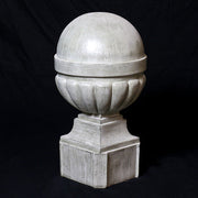 Ornate old world European finials with classical rounded tops and fluted bases, displayed in three graduated sizes on square pedestals. Other Angle