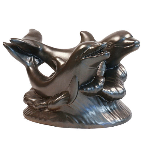 Two ornate dolphins leaping over stylized waves in a classical old world European sculptural design.