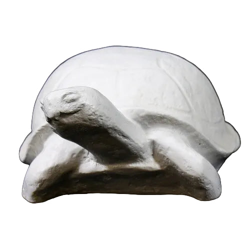Tortoise sculpture with classical old world European style, featuring smooth, rounded shell and stylized, simplified details.