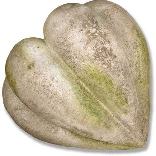 Heart-shaped ornament with pronounced ridges, featuring an old world European, classical style and weathered, ornate detailing.