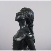 Ballet dancer figurine in classical pose with an ornate, old world European style and Renaissance-inspired detailing. Side View