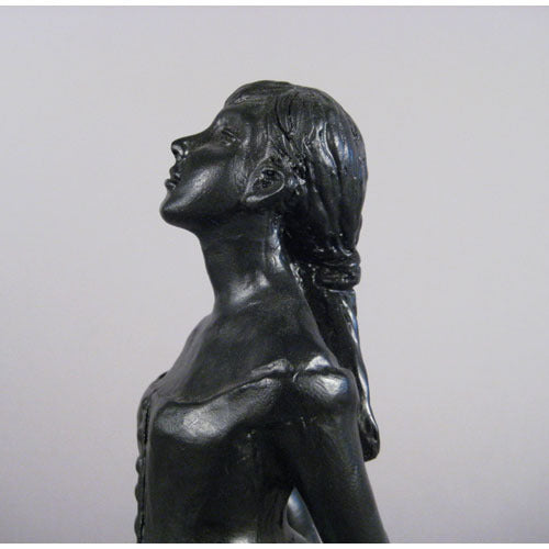 Ballet dancer figurine in classical pose with an ornate, old world European style and Renaissance-inspired detailing. Side View