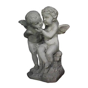 Cherub statue in old world European style with one cherub seated and another leaning in, featuring ornate Baroque detailing.
