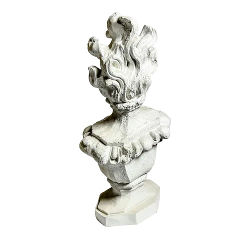 Baroque-style ornate bust with stylized flames rising from the top, featuring classical sculptural detailing and intricate design.