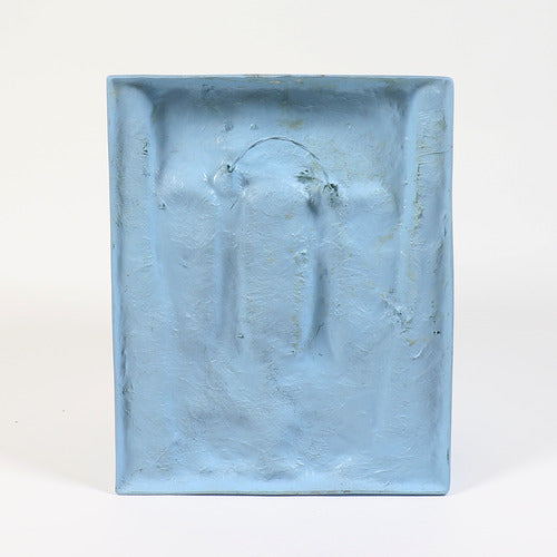 Abstract sculptural wall art featuring two elongated, stylized faces in a minimalist, classical European-inspired design. Side View