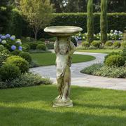 Cherub pedestal birdbath with ornate old world European detailing and classical Renaissance-inspired sculptural design. Side Angle