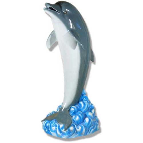 Dolphin figurine in classical style leaping above ornate swirling waves with old world European decorative detailing.