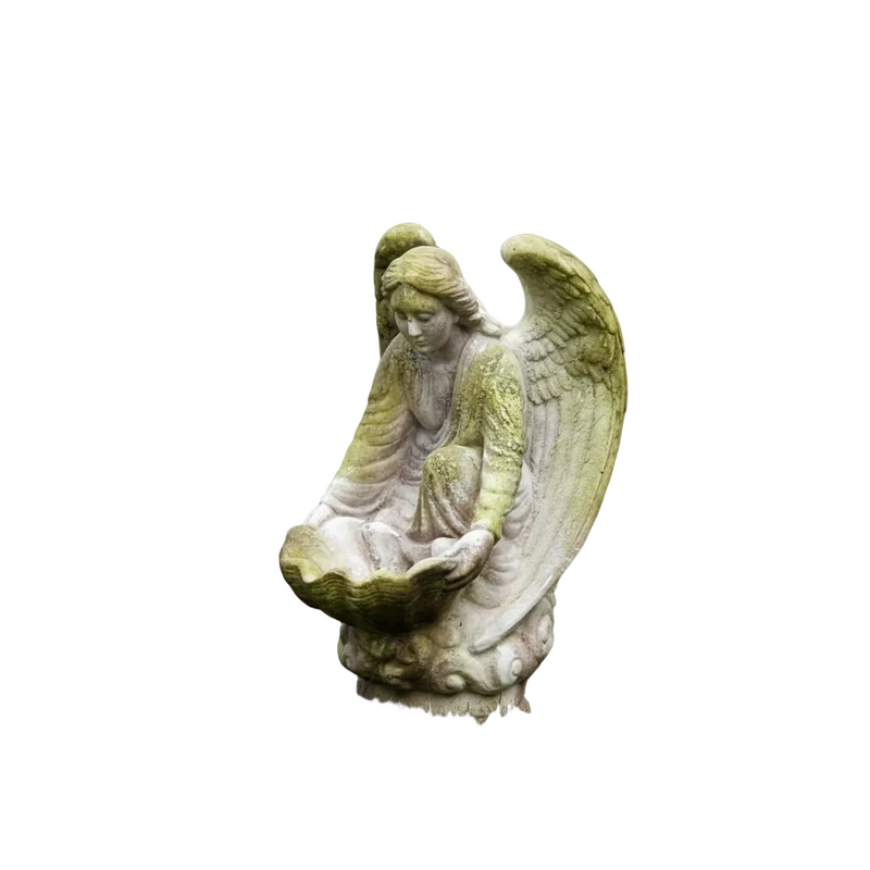 Innocent Kneeling angel holding a large scalloped shell bowl.