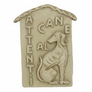 Relief plaque with a classical Italian greyhound and raised “Attenti al cane” text in an old world European style.