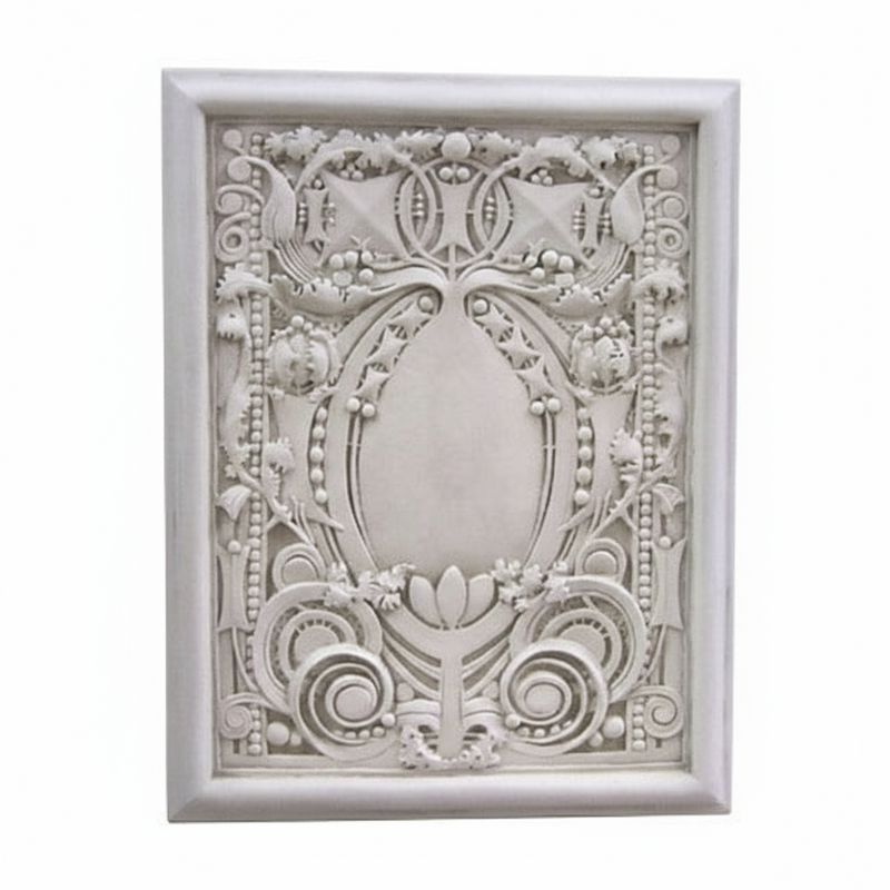 Ornate rectangular wall plaque with classical Baroque detailing, featuring intricate scrollwork and symmetrical floral motifs.