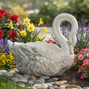 Swan-shaped planter with ornate feather detailing, classical European style, featuring elegant curves and sculpted accents. Side Angle