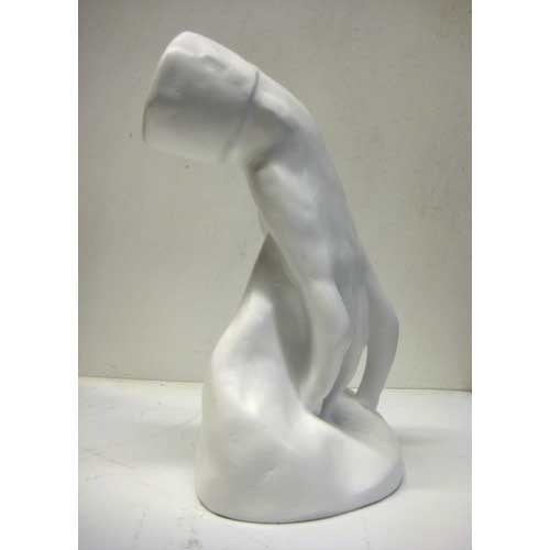Classical Renaissance-style torso sculpture with detailed musculature and an unfinished, headless form on a smooth base.