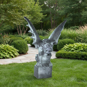 Gothic gargoyle statue with outstretched wings, fierce expression, and ornate medieval detailing on a pedestal base. Side Angle