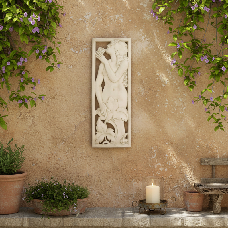 Classical relief panel featuring a nude figure playing panpipes amid ornate floral motifs in an old world European style. Side Angle