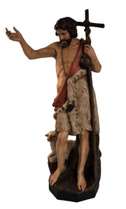 Saint John the Baptist statue in classical Renaissance style, holding a staff with a cross, draped in ornate, old world European attire.