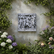Classical Greek-style relief sculpture depicting six figures in flowing robes engaged in a dynamic, ceremonial scene. Different Angle