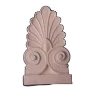 Ornate classical architectural finial with a fan-shaped shell motif and symmetrical scrollwork in old world European style.