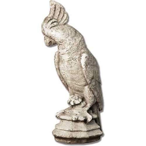 Ornate old world European parrot statue with classical detailing and weathered, antique finish on a decorative pedestal base.