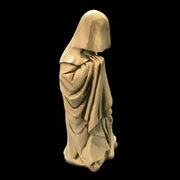 Hooded medieval figure statue with draped, flowing robes in an old world European Gothic style, facing away. Side View
