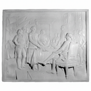 Classical bas-relief panel depicting a group of men in ornate 18th-century attire gathered around a table in a stately interior.