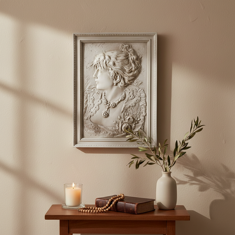 Classical bas-relief portrait of a woman in ornate Victorian attire with elaborate jewelry, framed in an old world European style. Side Angle