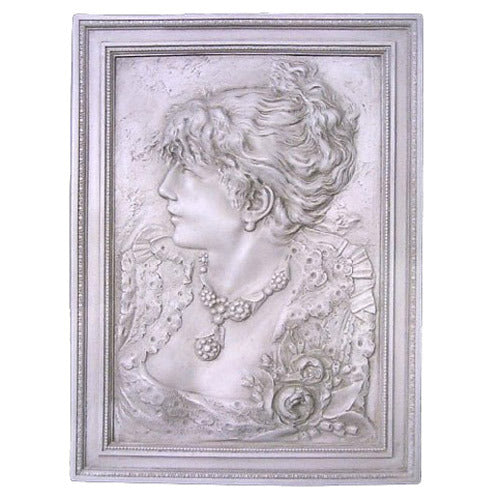 Classical bas-relief portrait of a woman in ornate Victorian attire with elaborate jewelry, framed in an old world European style.