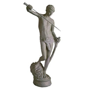Classical Renaissance-style statue of a young male figure holding a sword and standing on a decorative pedestal.