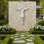 Crucifix with classical Renaissance style, featuring an ornate depiction of Christ with outstretched arms and detailed drapery. Side View