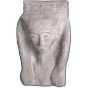 Ancient Egyptian-style sculpted head with stylized features, ornate headdress, and hieroglyphic carvings in classical relief.