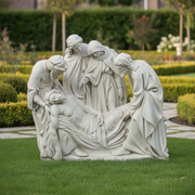 Baroque-style sculpture depicting four robed figures mourning over a reclining man in a dramatic, old world European composition. Side Angle