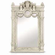 Ornate Baroque mirror with classical cherub crest, decorative swags, and intricate old world European architectural detailing.