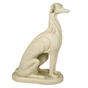 Greyhound statue with classical, old world European style and elegant, sculpted details in a seated pose on a rounded base.