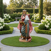 Regal king figurine in ornate old world European style, wearing a crown and flowing Baroque robe, holding a decorative vessel. Side View