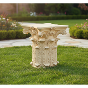 Corinthian column capital with ornate acanthus leaf carvings, classical old world European architectural style. Side Angle