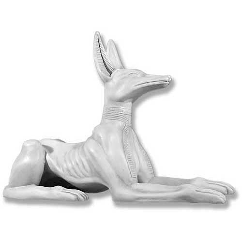 Anubis jackal statue in classical Egyptian style with ornate collar and stylized, elongated features in a reclining pose.
