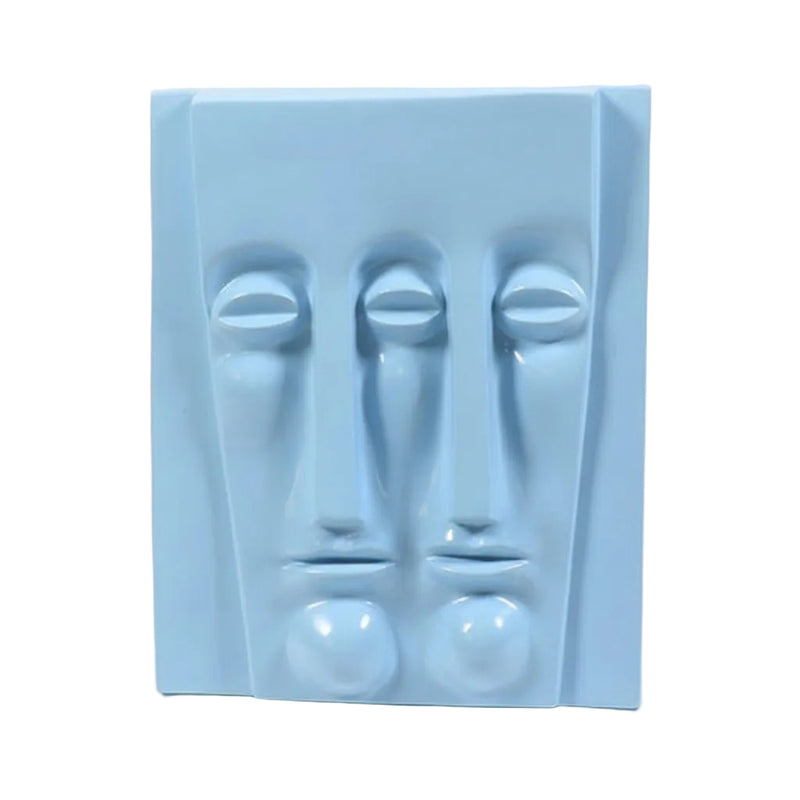 Abstract sculptural wall art featuring two elongated, stylized faces in a minimalist, classical European-inspired design.