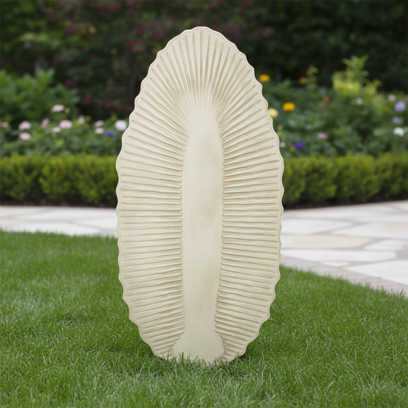 Ornate old world European decorative tray with elongated leaf shape and classical ribbed detailing in a symmetrical design. Side Angle