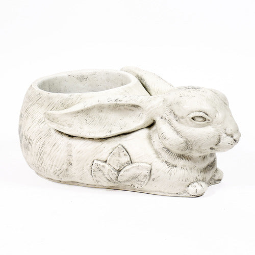 Rabbit-shaped planter with ornate floral motif, featuring old world European style and filled with yellow and orange flowers. Other Angle